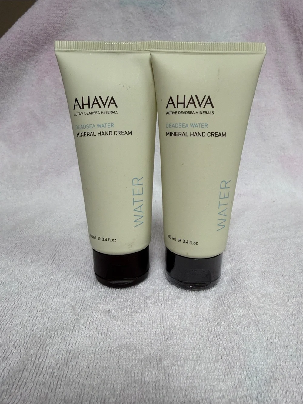 AHAVA Water Mineral Hand Cream Duo in Cream and Black